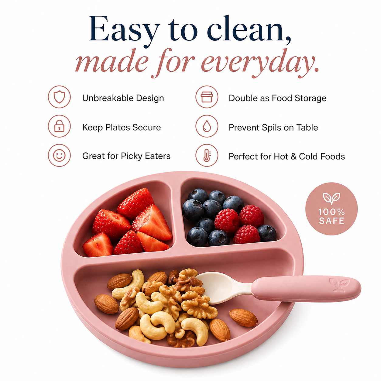 Pink silicone baby meal tray with a spoon, shown with fruit and nuts on a white background, with marketing text and feature icons above it.