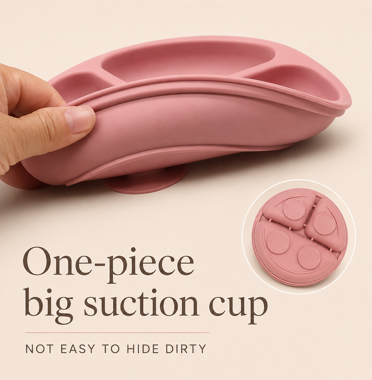 A pink silicone suction-style plate being held by a hand, with text reading 'One-piece big suction cup' and 'NOT EASY TO HIDE DIRTY,' plus a circular inset showing the underside of the cup.